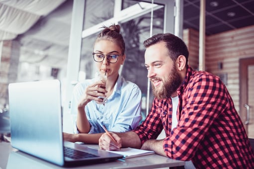 Young couple, writing, laptop